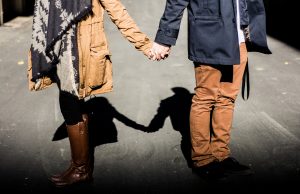 Commitment - Couple holding hands