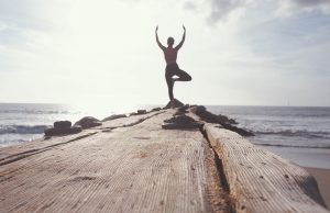 yoga post on a rock pathway