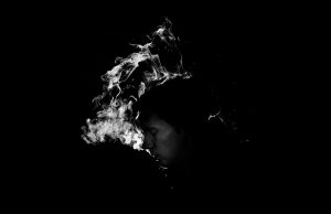 white smoke with shadow of a man